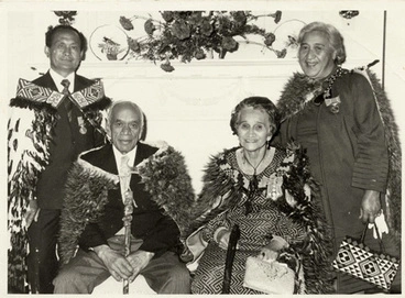 Image: Carver Wiremu Te Ranga (Piri) Poutapu (seated, left) after receiving the MBE honour in 1974