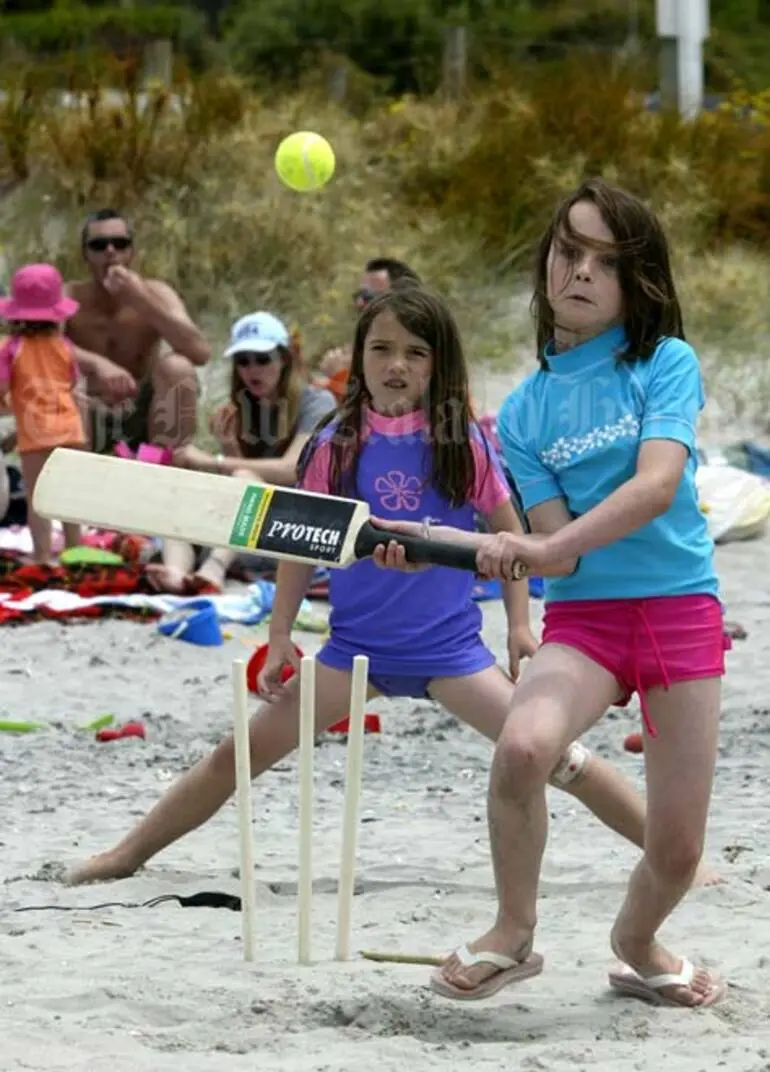 Image: Children playing beach cricket