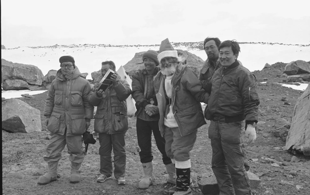 Japanese party receive some 'seasonal good cheer' from Father Christmas