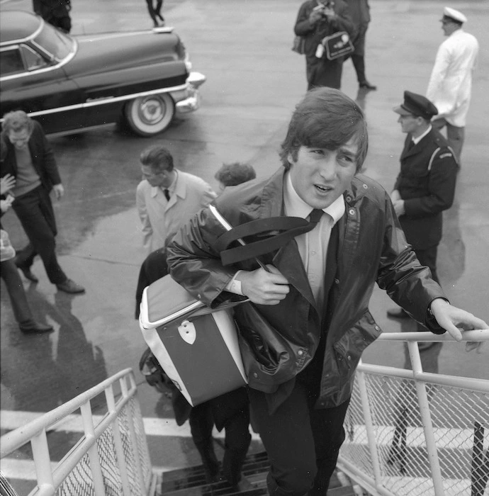 Beatle John Lennon boarding aircraft after visit to Wellington