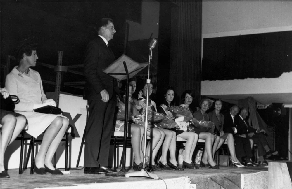 Eastern District Pastoral Queen competitors listening to speech.