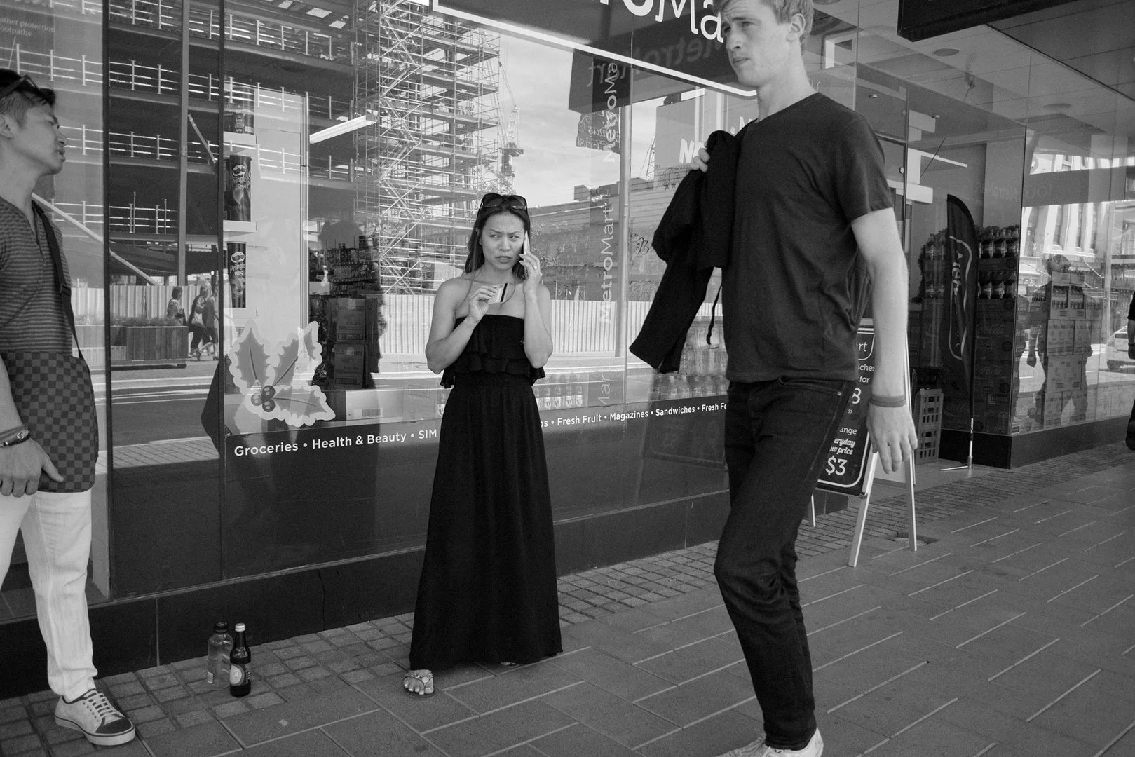 Cell phone call outside MetroMart