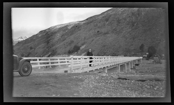 Man standing on Mount White bridge