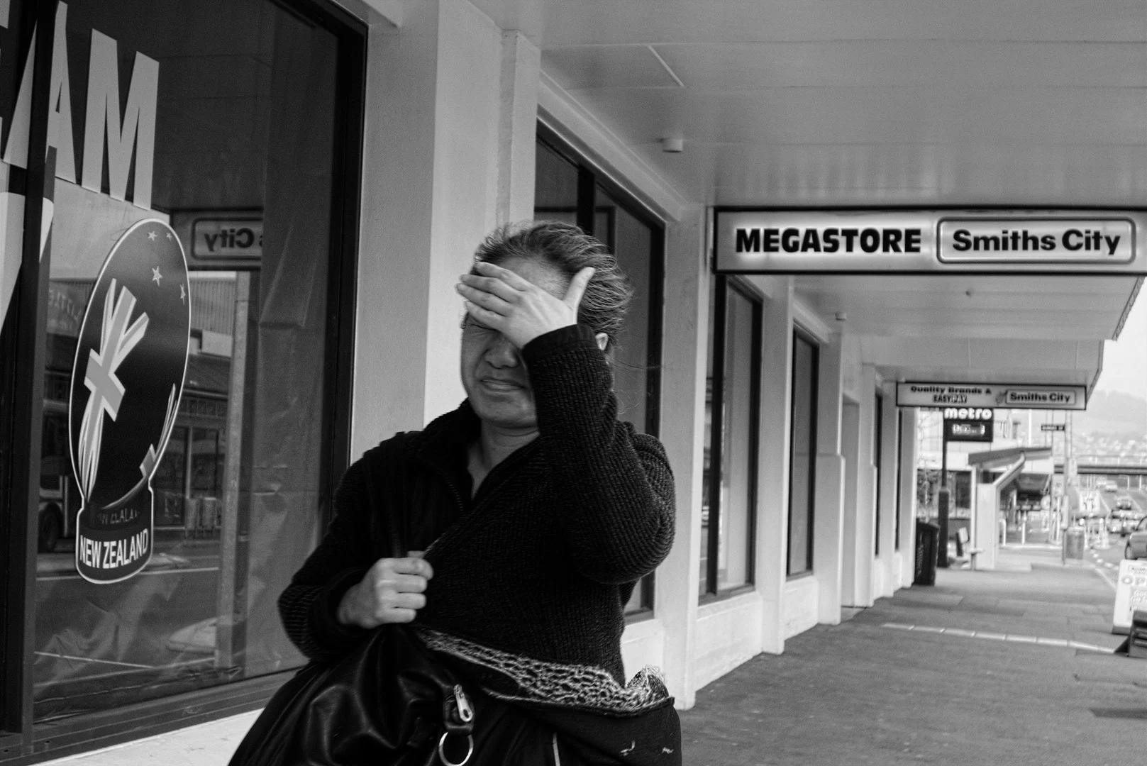 covered-face-outside-smiths-city-record-digitalnz