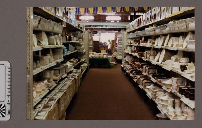 Photograph - Aisle in shop displaying crockery
