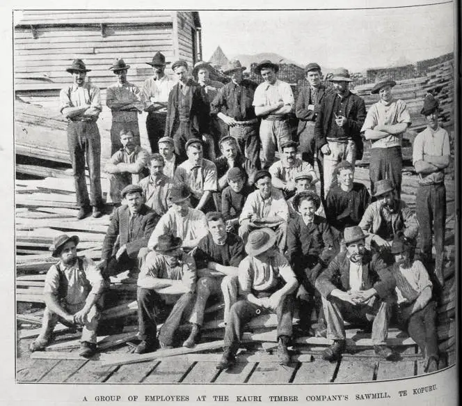 A group portrait of staff at the Kauri Timber Company's sawmill, Te ...