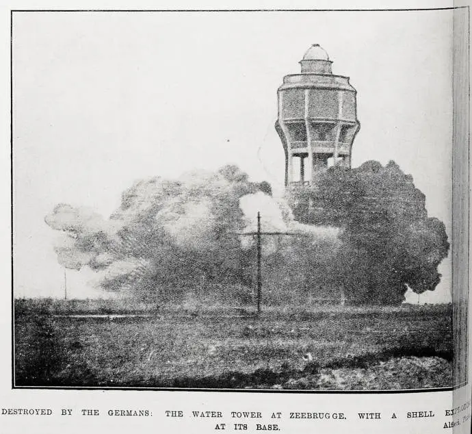 Destroyed by the Germans: the water tower at Zeebrugge, with a shell exploding at its base