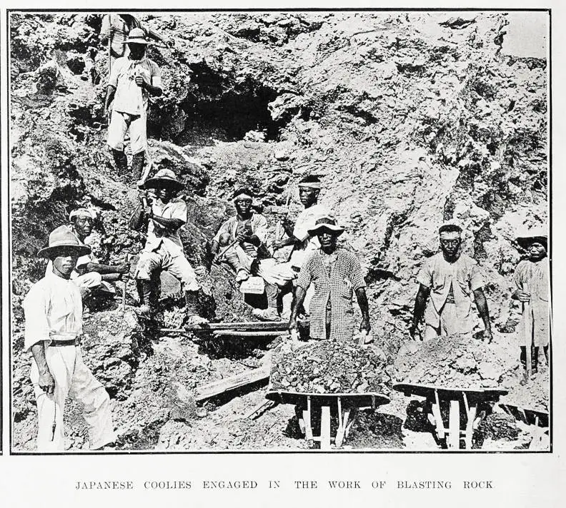 Japanese coolies engaged in the work of blasting rock