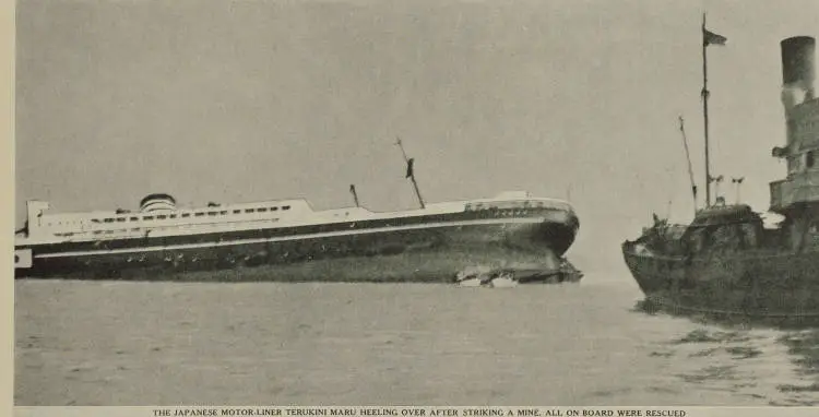 The Japanese motor-liner Terukini Maru heeling over after striking a mine. All on board were rescued