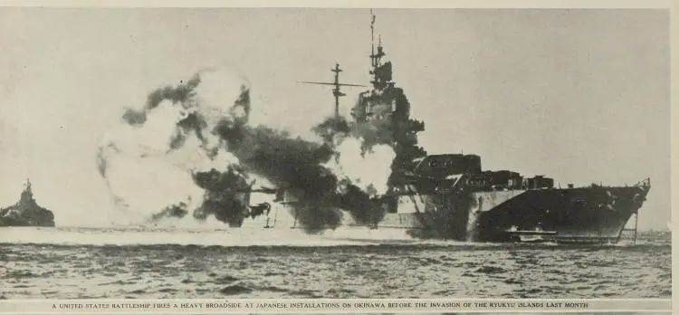 A United States battleship fires a heavy broadside at Japanese installations on Okinawa before the invasion of the Ryukyu islands last month