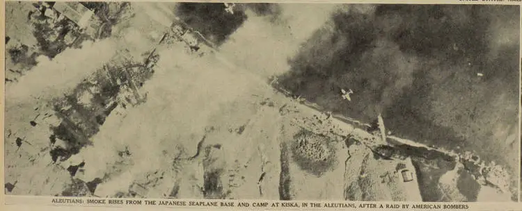 Aleutians: smoke rises from the Japanese seaplane base and camp at Kiska, in the Aleutians, after a raid by American bombers