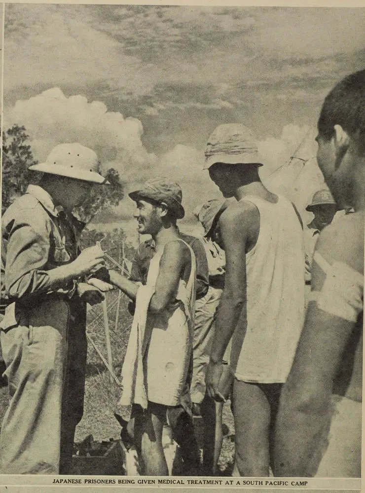 Japanese prisoners being given medical treatment at a South Pacific camp