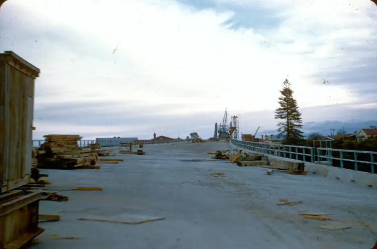 Road surface of the bridge takes shape, northern end, 1958