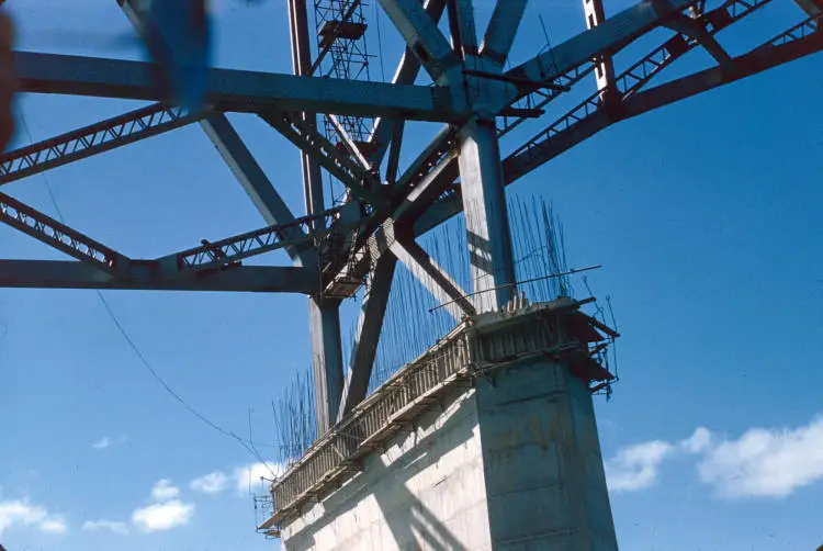 View from below the bridge showing support pier and steel framework, 1959
