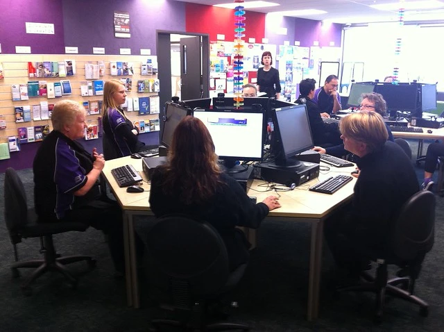 Library staff getting familiar with the PCs