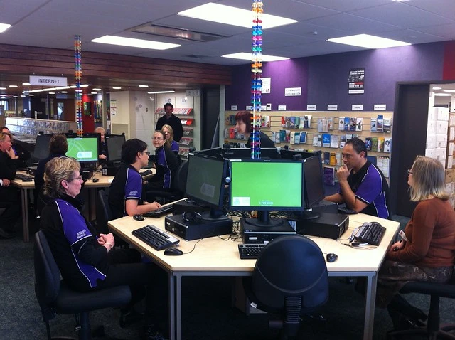 Library staff getting familiar with the PCs