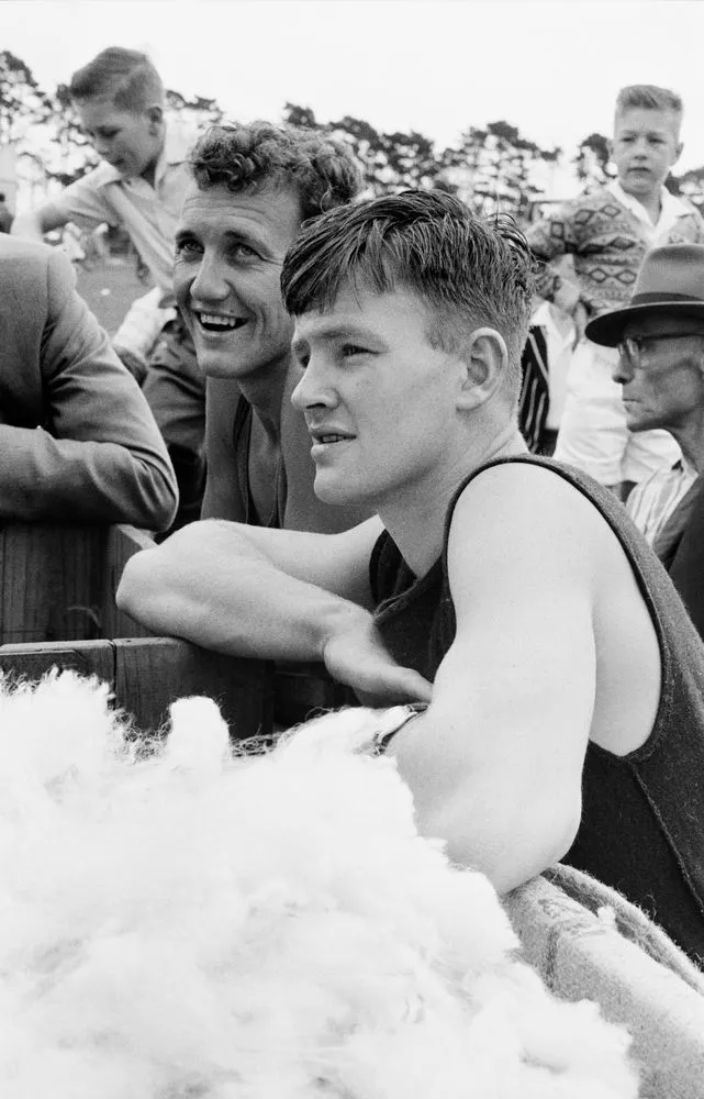 Shearer watching competition at the Kumeu A & P Show. Taken for ‘New Zealand, gift of the sea’ (1963)