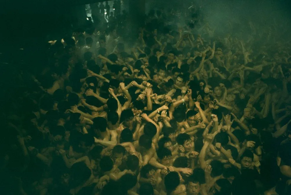 Winter festival near Okayama, Japan, where 8,000 youths scramble for a lucky stick thrown by a priest. Taken for a series on Japan for ‘Life’