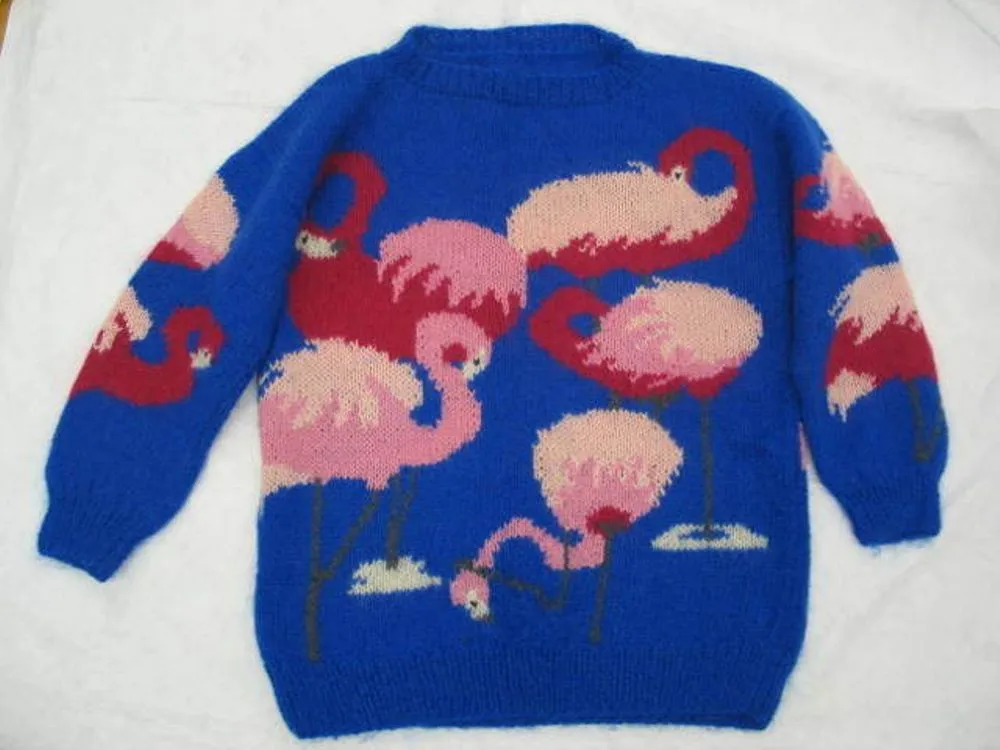 Jersey (flamingoes) and swing label with spare wool | Record | DigitalNZ