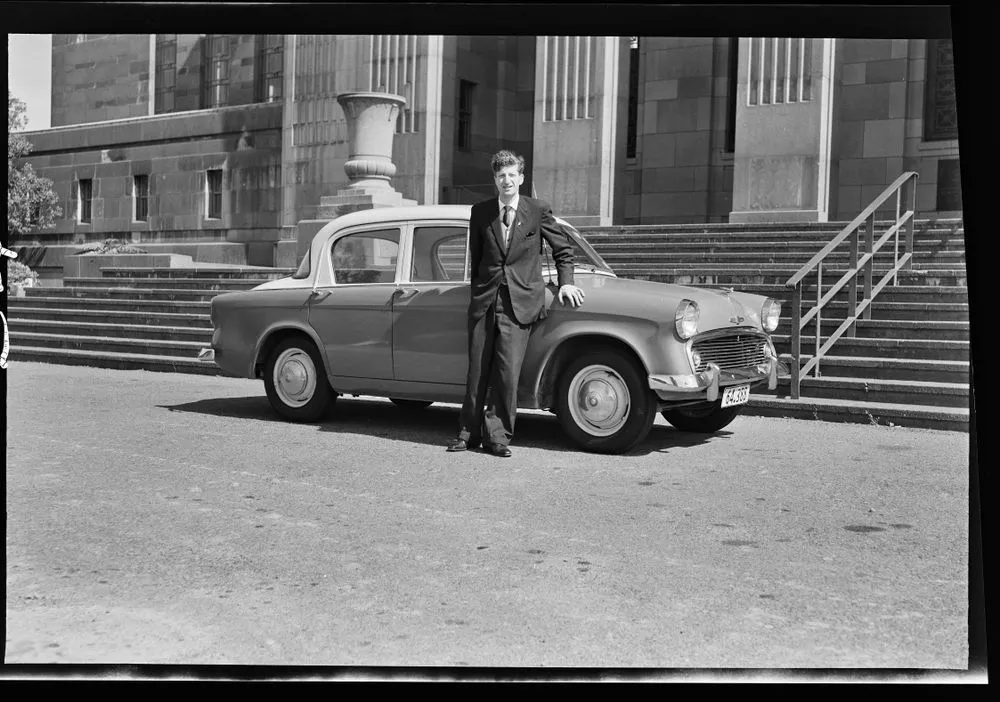 Ronald Woolf and car; inscribed 'Mr. R Woolf, Personal'
