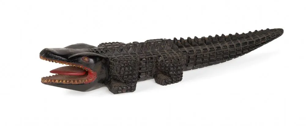 Carved and painted wooden model of an alligator