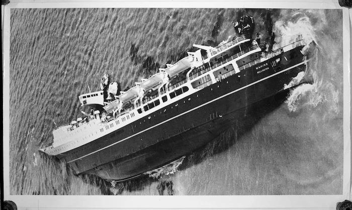 Aerial view of the wreck of the Wahine, lying on its side in Wellington Harbour