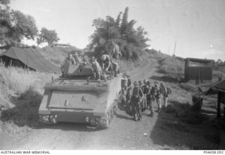 Members of D Company, 6RAR/NZ (ANZAC) Battalion (comprising the 6th Battalion, The Royal Australian Regiment and a component of the 1st Battalion, the Royal New Zealand Infantry Regiment), and ..