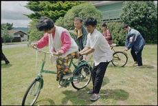 Cambodian refugees learning to ride bicycles in Waikanae