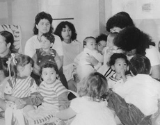 Women teaching preschoolers Māori language