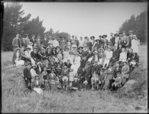Large unidentified group, including men, women and children, in an unidentified outdoor location, probably Christchurch district