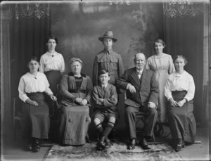 Studio portrait of unidentified family group, probably Christchurch district, includes young man in army uniform