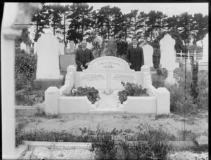 Two men probably James Rowe and William H Stephens stand behind gravestones of Elizabeth Jane Rowe and Alice Stephens