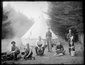 Unidentified young men preparing food at 'Daisy Camp', Christchurch