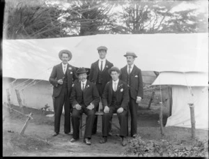 Group of unidentified men wearing business attire, at a campsite, possibly Christchurch district