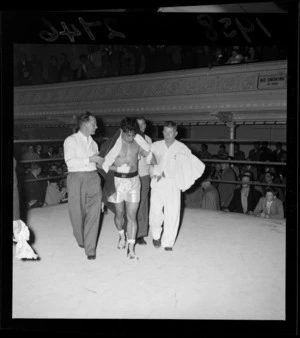 Boxer Tuna Scanlan with his trainers, at a match with Jack Walsh, Wellington