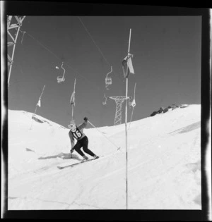 An unidentified skier at the New Zealand Ski Championship at Mt Ruapehu, including chairlift in the background