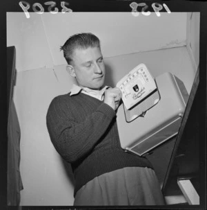 A man with a portable radio