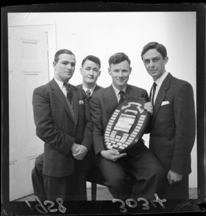 Unidentified members of the [Wellington] Student's Accountant Society debating team with the Inter-Society Debate shield that they won off Christchurch
