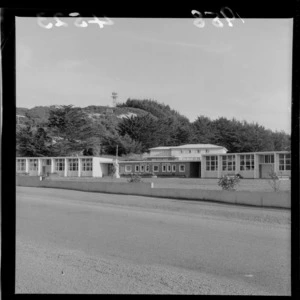 Exterior view of Saint Patrick's School, including a view of Our Lady of Lourdes statue on hill behind, Parapauraumu, Kapiti Coast district