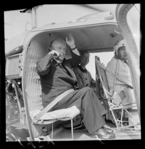 Walter Nash taking a trip in a United States helicopter