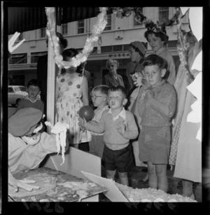 Children looking at the Christmas display in James Smith Ltd department store, Wellington