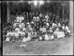 Large unidentified group of men, women and children outdoors, probably Christchurch district