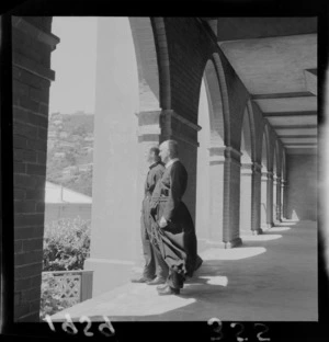 Two unidentified monks standing in the cloisters of St Gerard's Monastery, Wellington