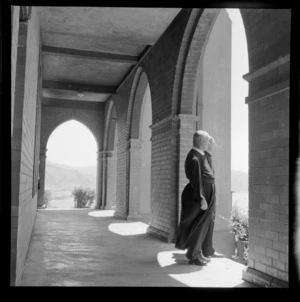 Two unidentified monks standing in the cloisters of St Gerard's Monastery, Wellington