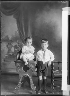 Studio portrait of an unidentified boy and a baby, possibly Christchurch district