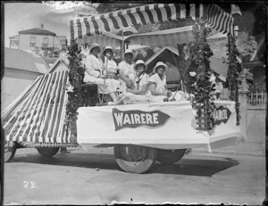 New Napier Week Carnival, truck float with women from the local Wairere Croquet Club, in uniforms and with mallets, Napier, Hawke's Bay District