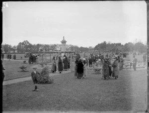 Cornwall Park, with memorial in the background and crowds of people, Hastings
