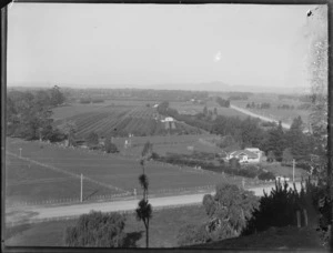 View of crops in the field, farmland, rural roads and farm house from hill, Hawke's Bay District