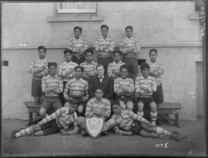 Rugby team, Maori Agricultural College, with trophy, Hastings district