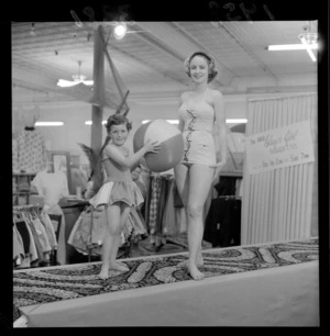 Child and woman modeling swimsuits on catwalk at Kirkcaldie & Stains department store, Wellington
